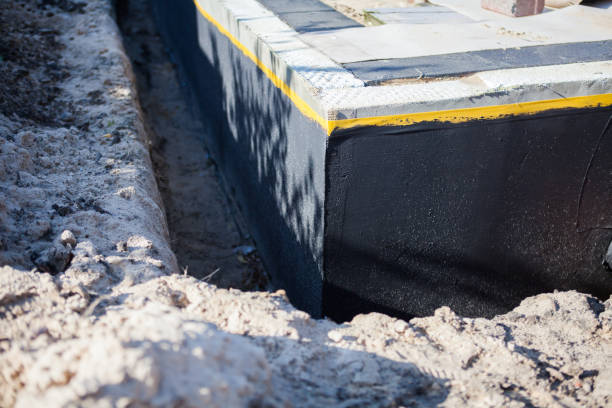 Residential Interior Drainage System installation at a Versailles, OH home by SJ Waterproofing Pros